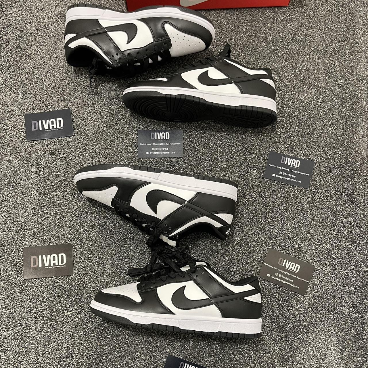 nike dunk low black and white original price