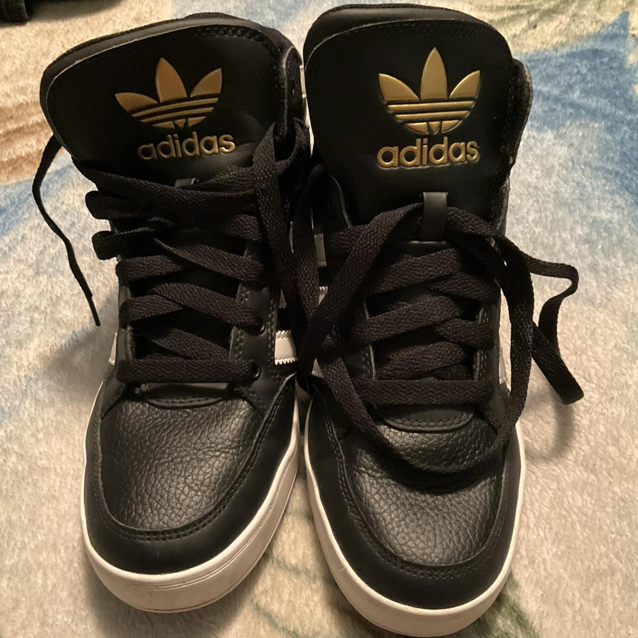 Black gold adidas high tops hotsell