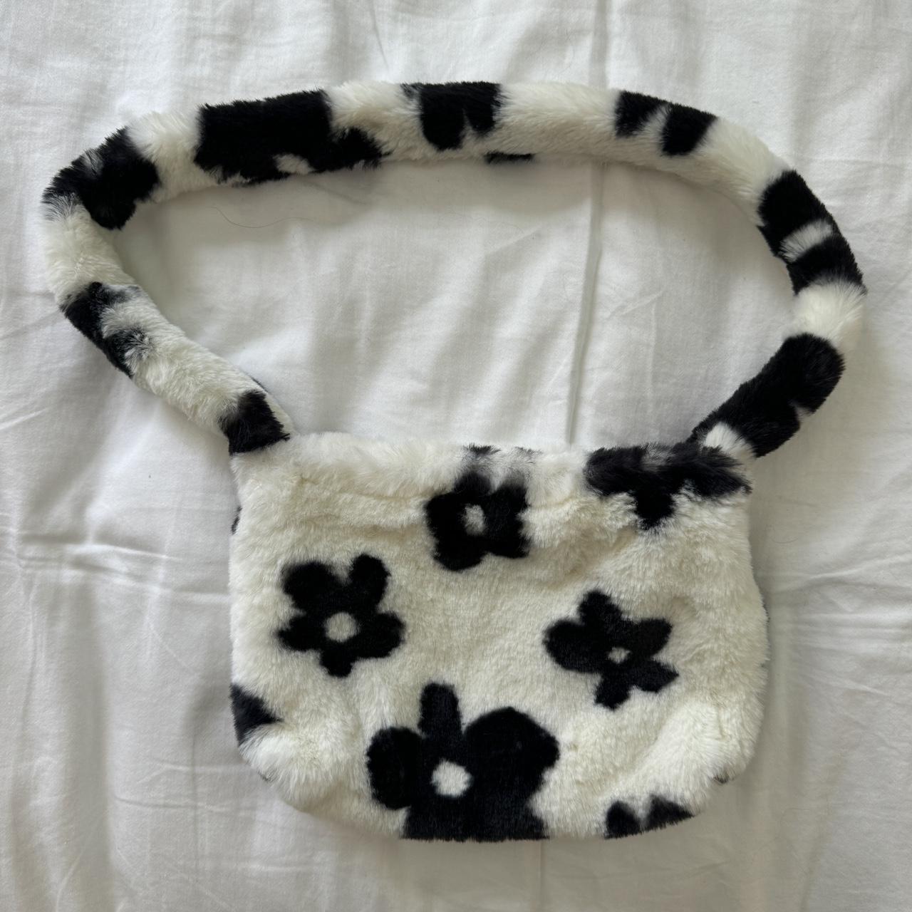 White fuzzy bag with black flowers sale