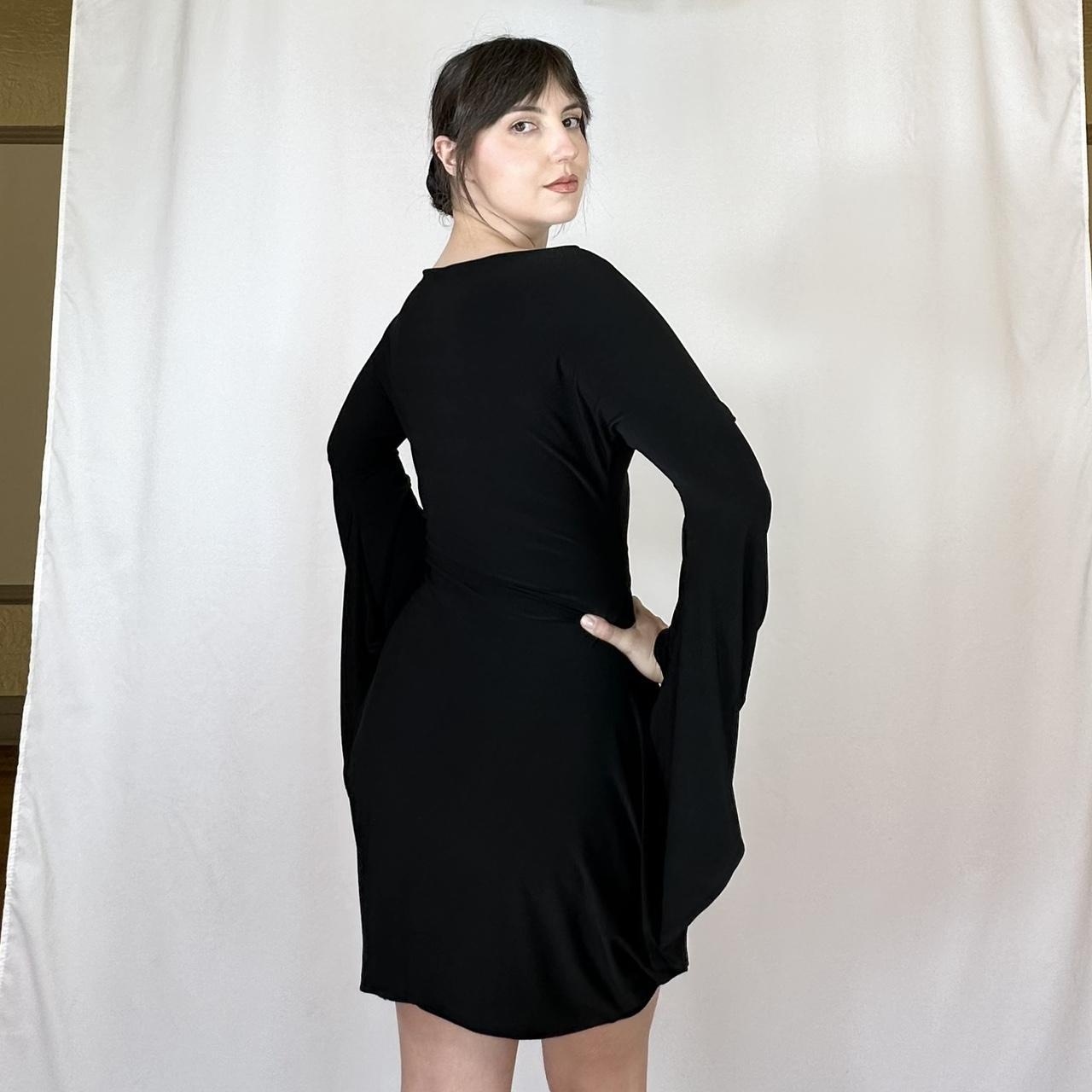 Norma Kamali Women's Black Dress | Depop