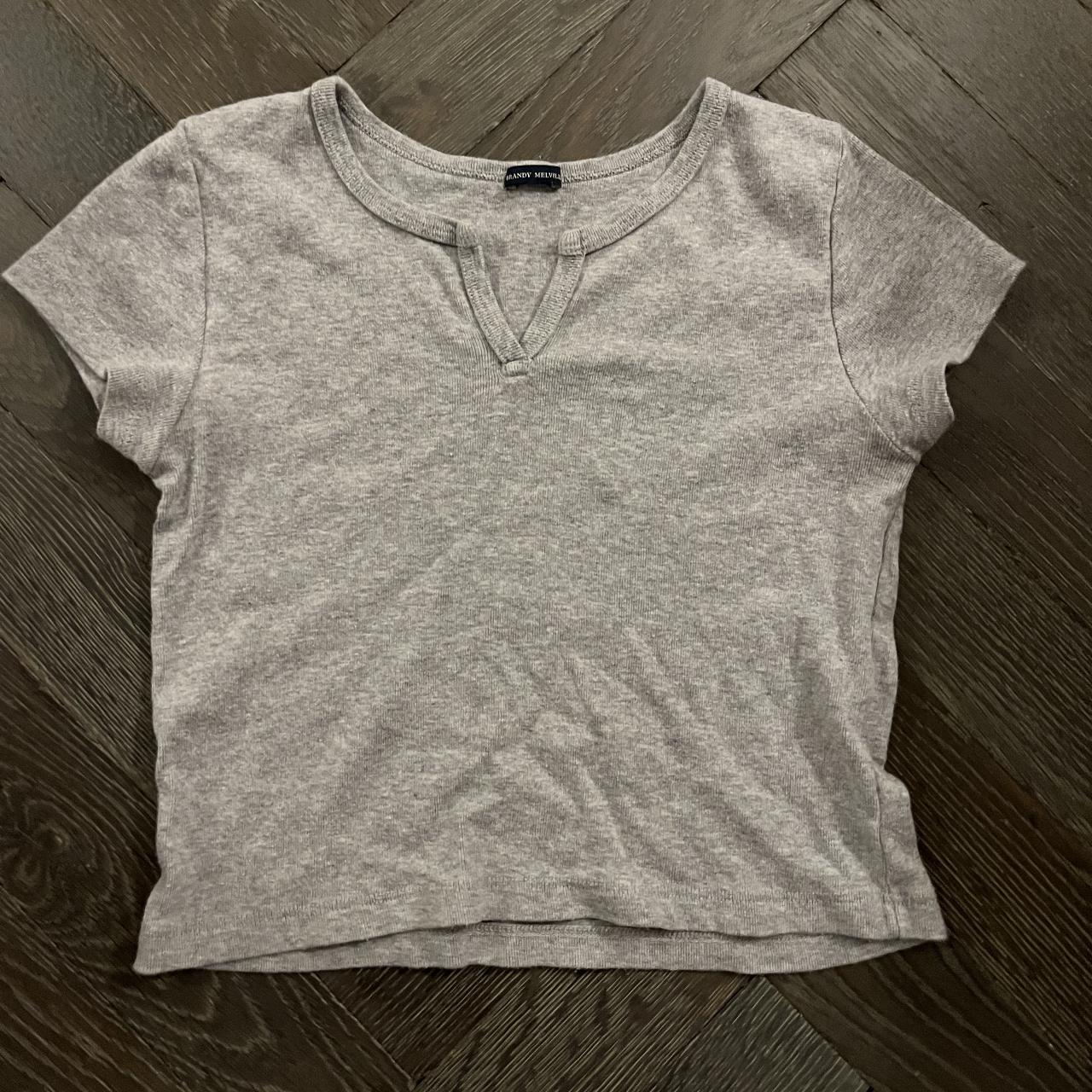 grey brandy melville baby tee worn but in good... Depop