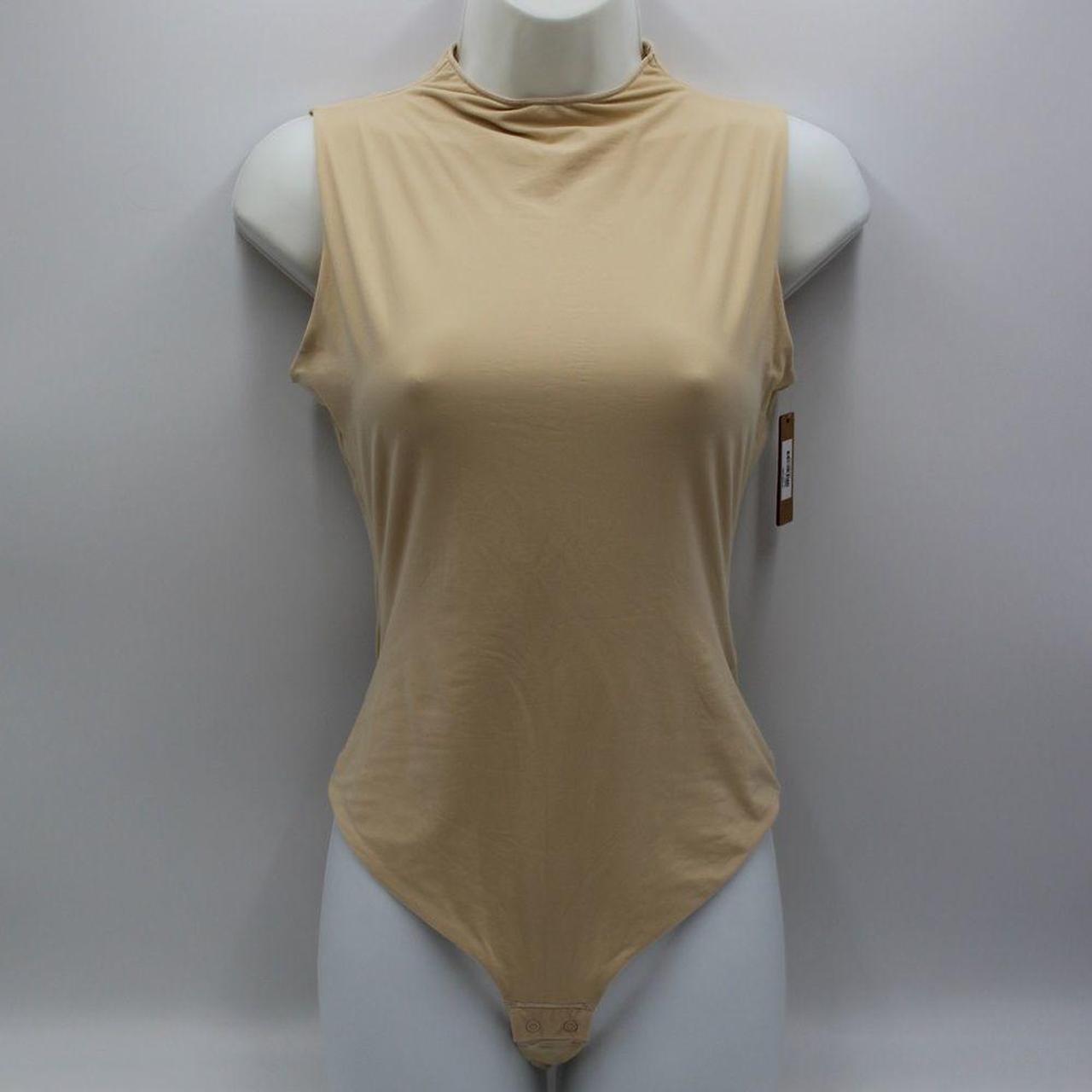 Skims high neck body suit in sand, NWTS, all photos