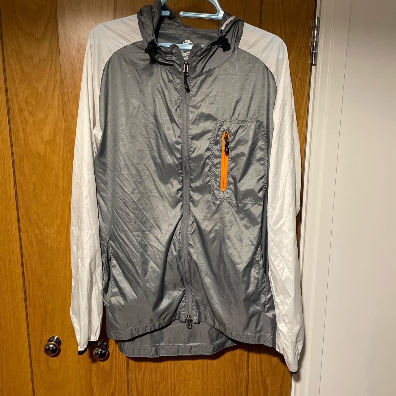 Grey and White Nike Shiny Jacket Size L In... Depop