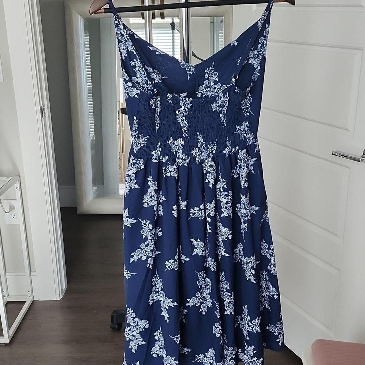 Navy blue dress with white floral print. mesurments... - Depop