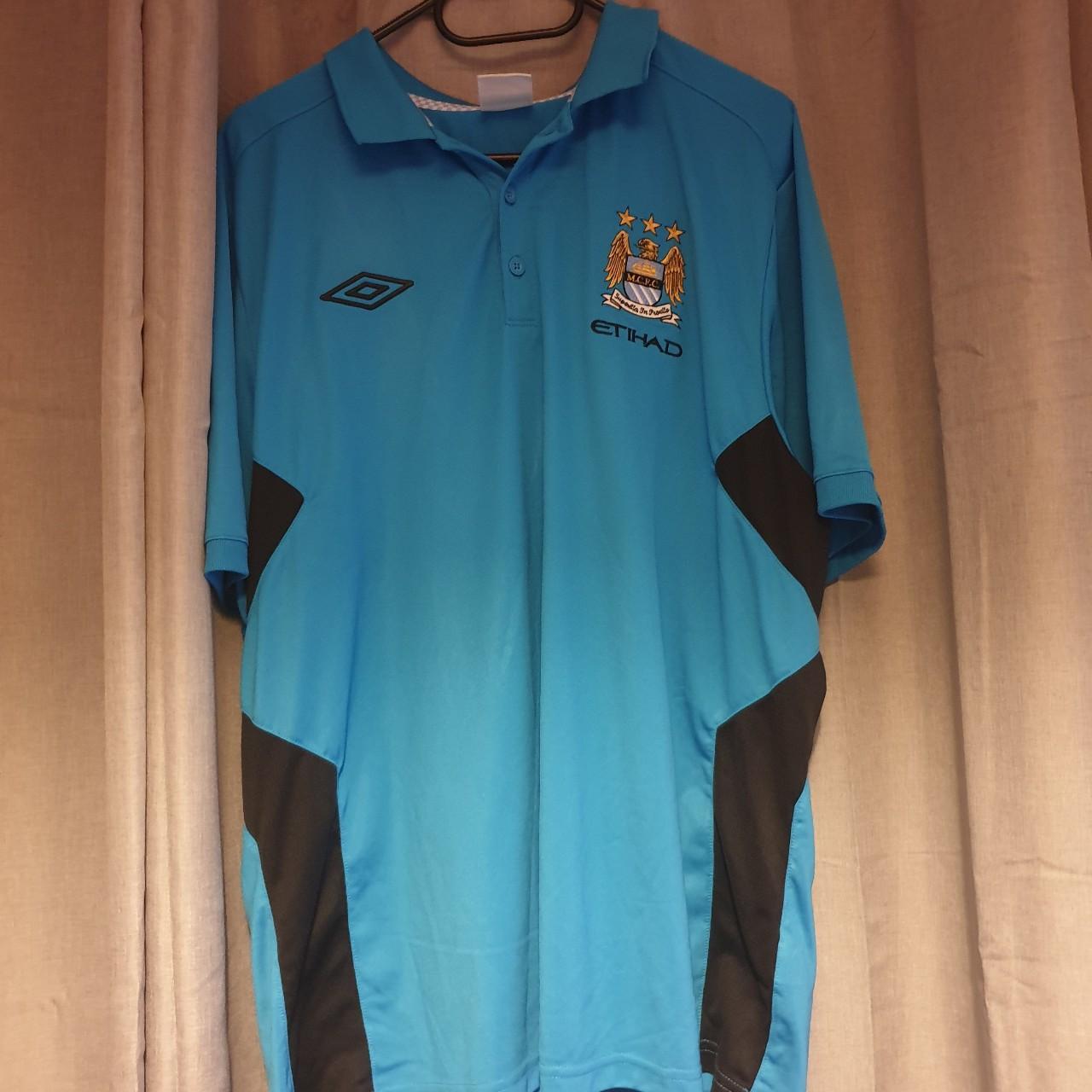 Manchester city training football shirt from around... Depop