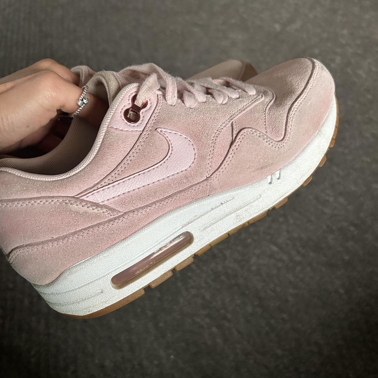 Pink suede hot sale nike air