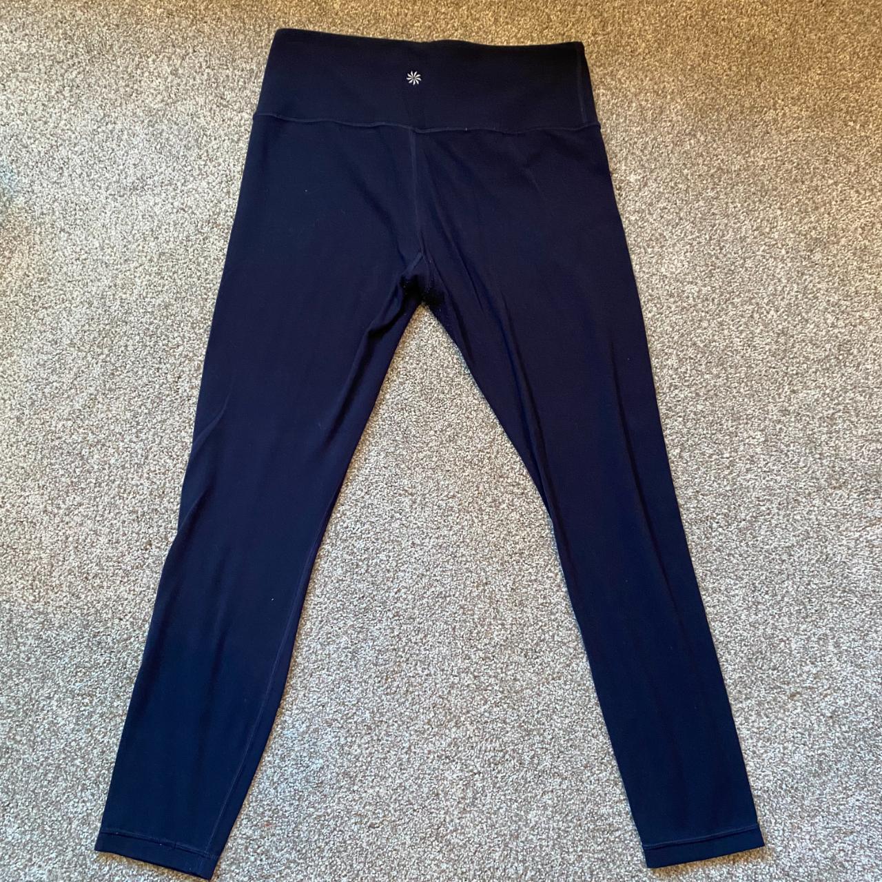 navy Athleta leggings small white stain on left... Depop