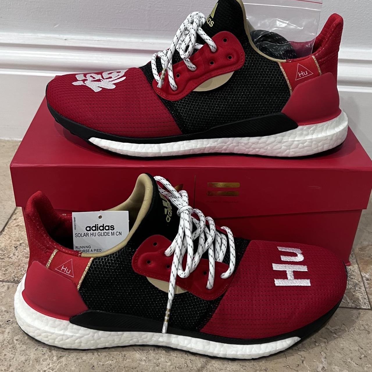 Human race ultra boost orders red