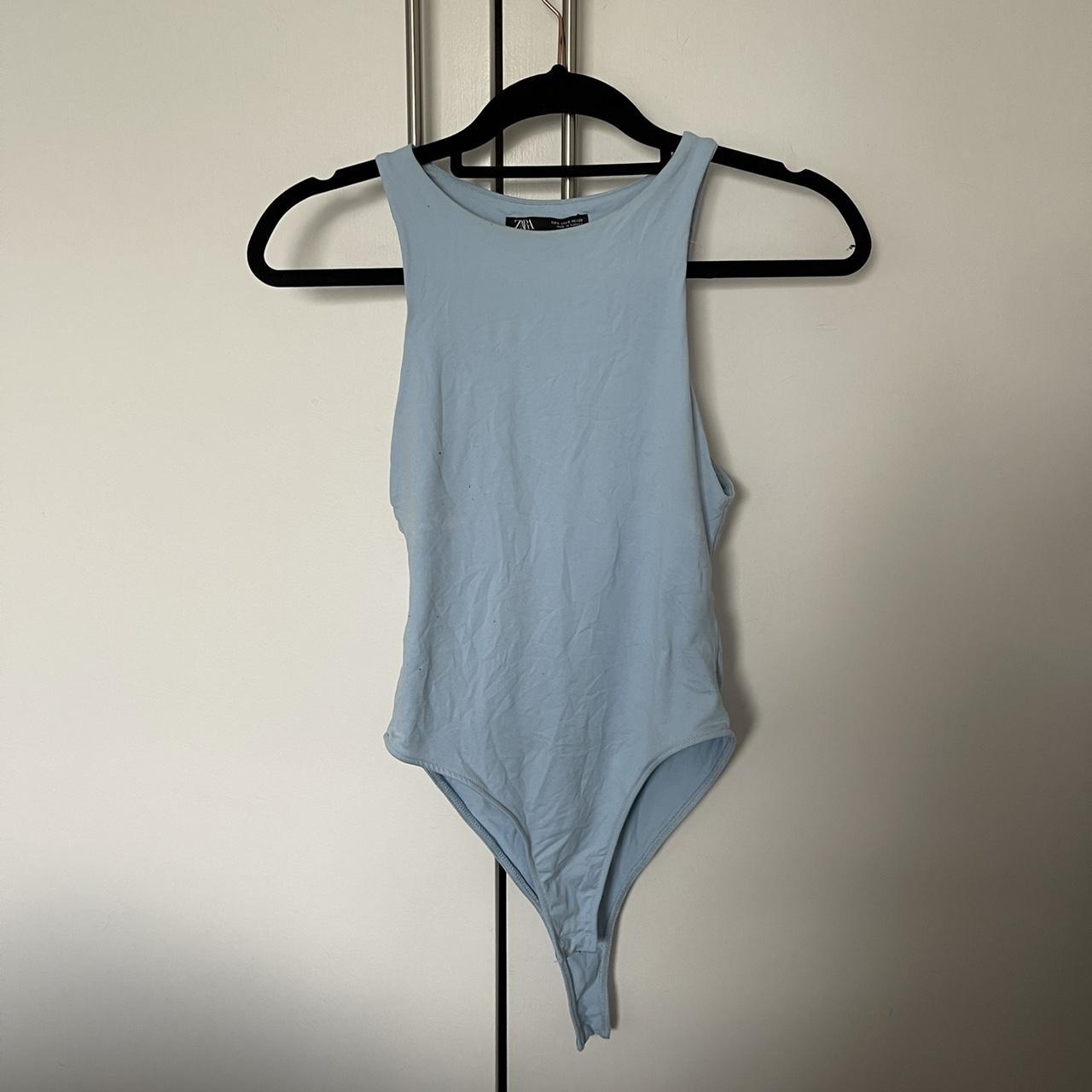 Zara baby blue bodysuit, size S. Slight bobbling but... Depop