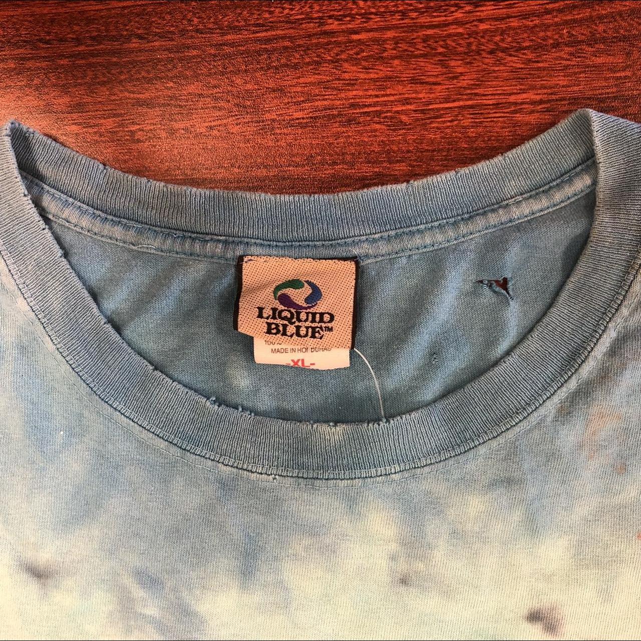 Vintage liquid blue tie dye Raiders T-shirt size - Depop