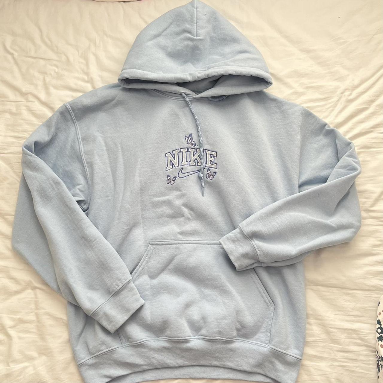 -medium sky blue nike hoodie with butterflies. it... - Depop