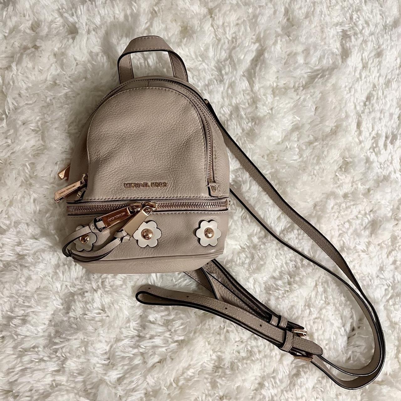 Nude pale pink rose gold mini mk backpack purse. Depop