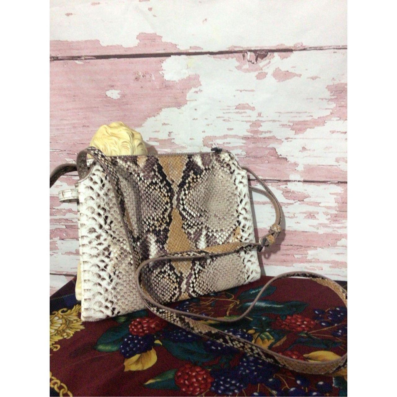 A new discount day snakeskin purse