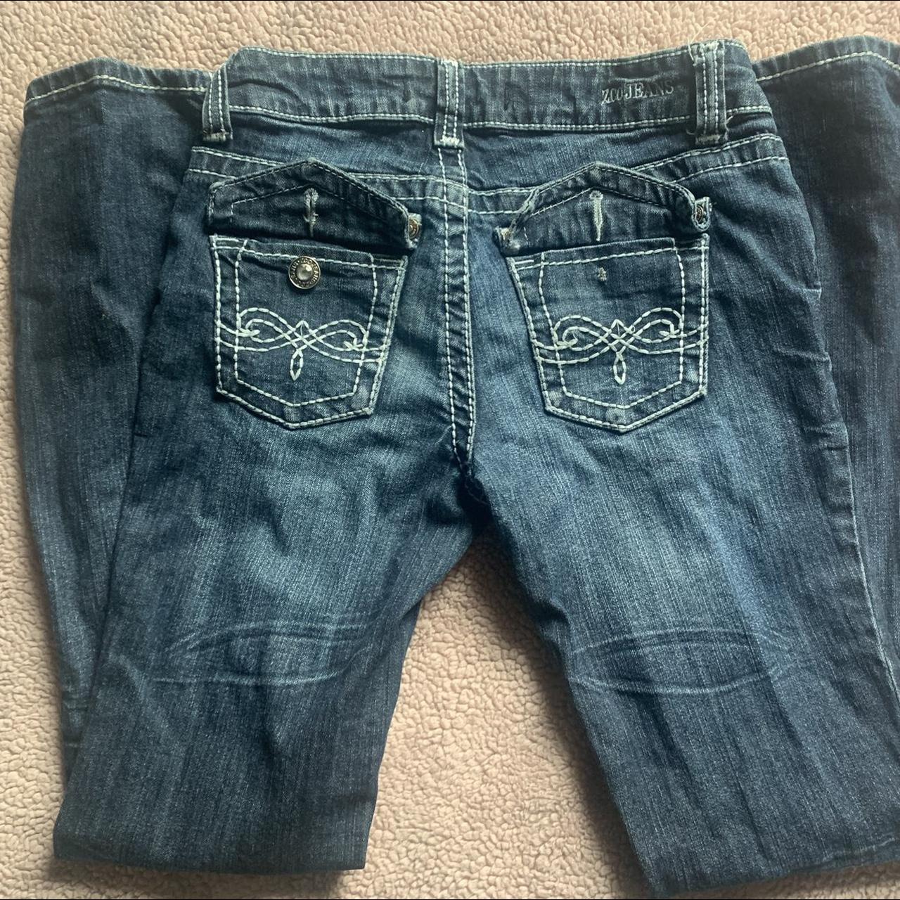 Rock Revival style bootcut jeans One button fell off... - Depop