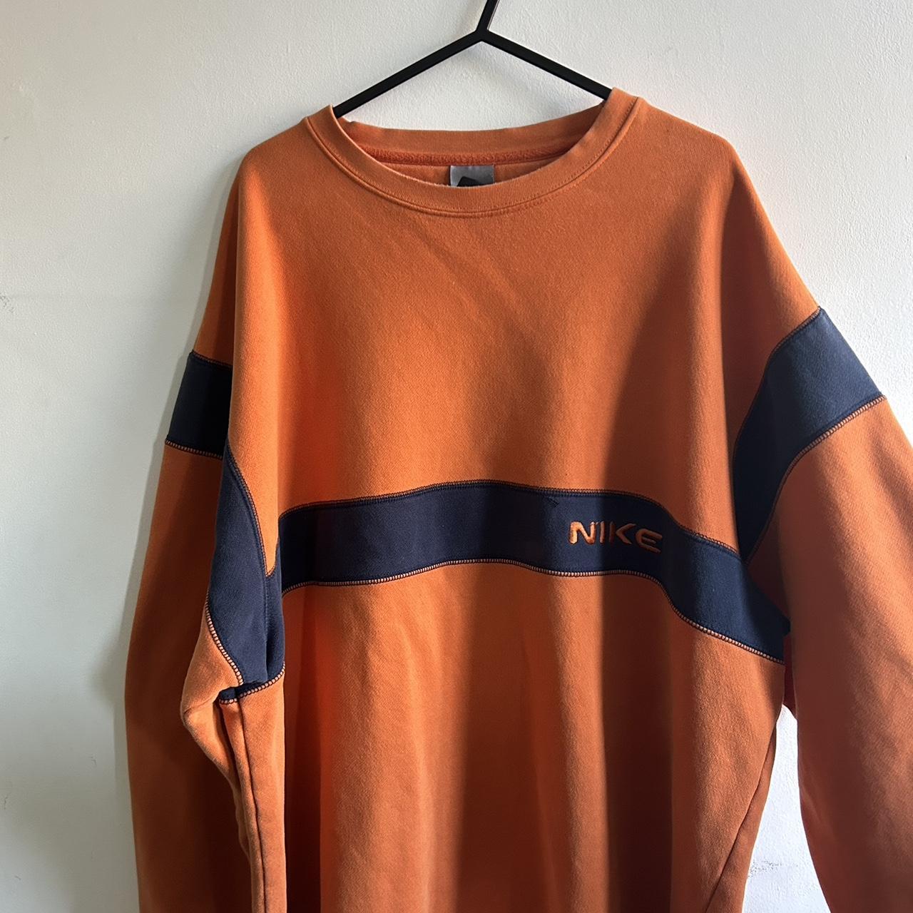 blue and orange nike sweatshirt