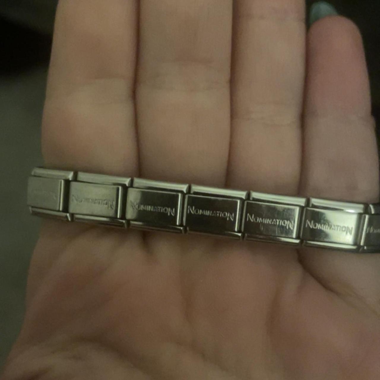 Nomination bracelet, 16 links, 2 charms - Depop