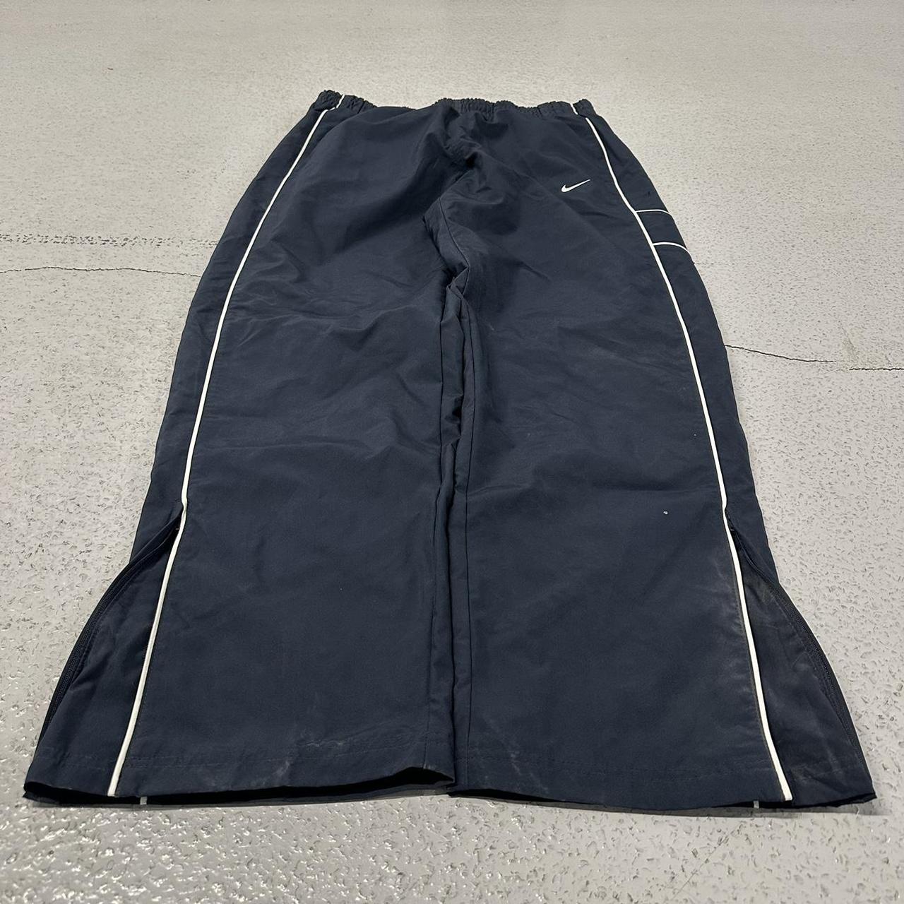 Nike Baggy track pants windbreakers parachute navy... Depop