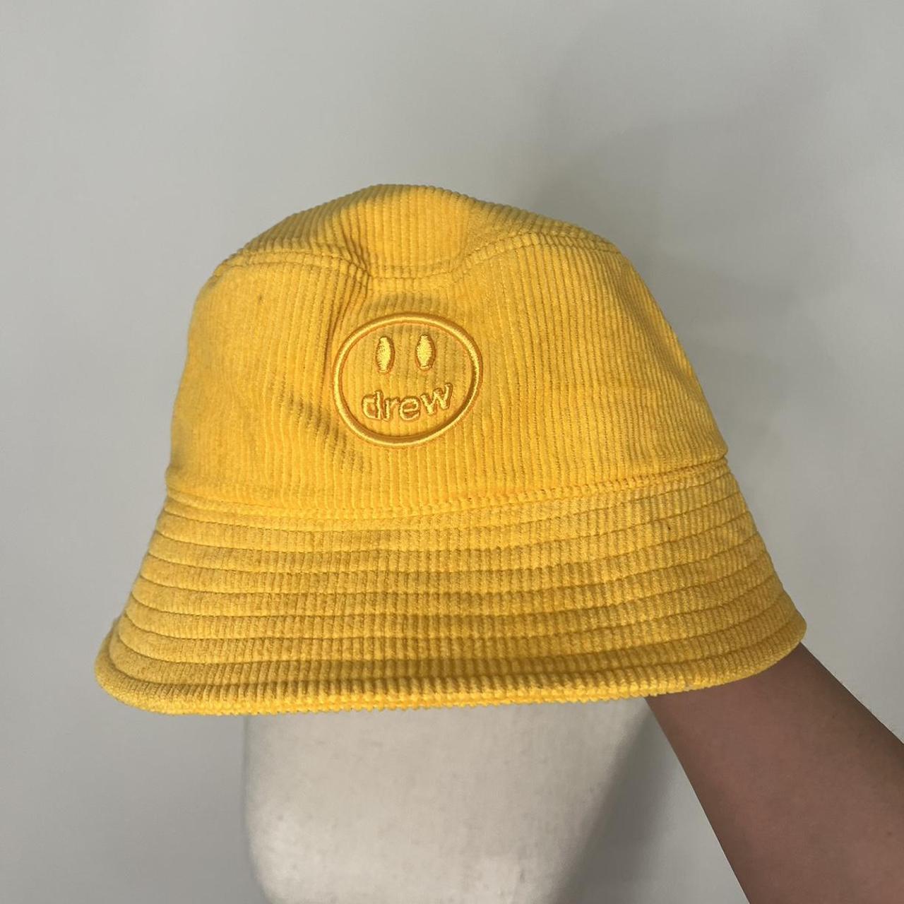 Yellow Drew House bucket hat Never worn !! Please... Depop