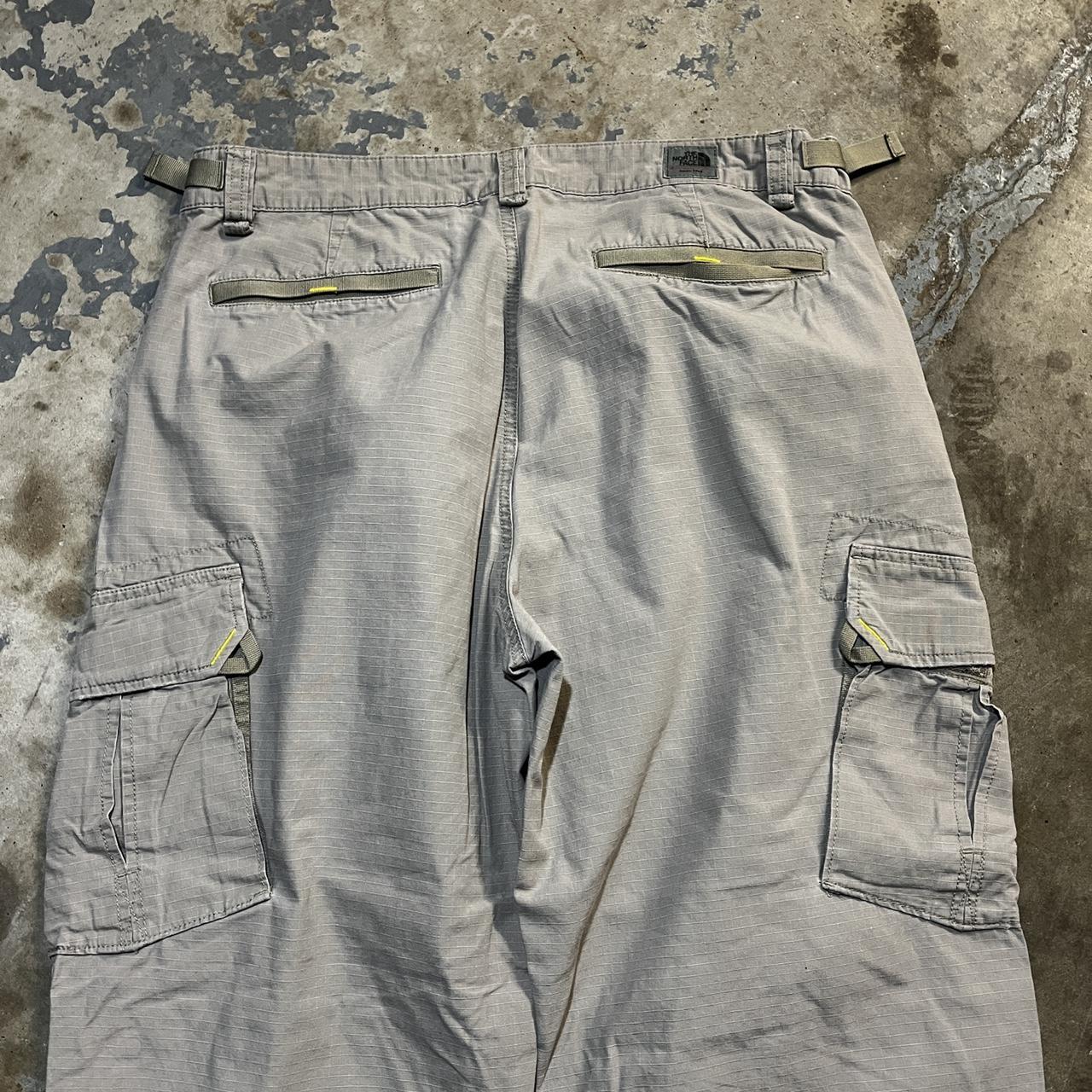 crazy baggy north face cream colored cargos great... - Depop