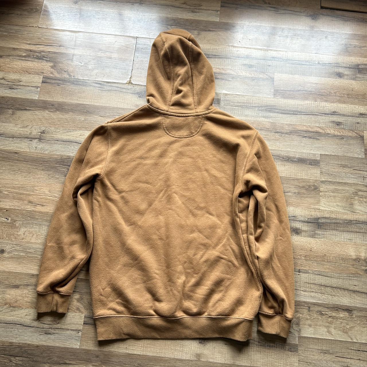 Carhartt tan hoodie with front pocket and logo on... - Depop