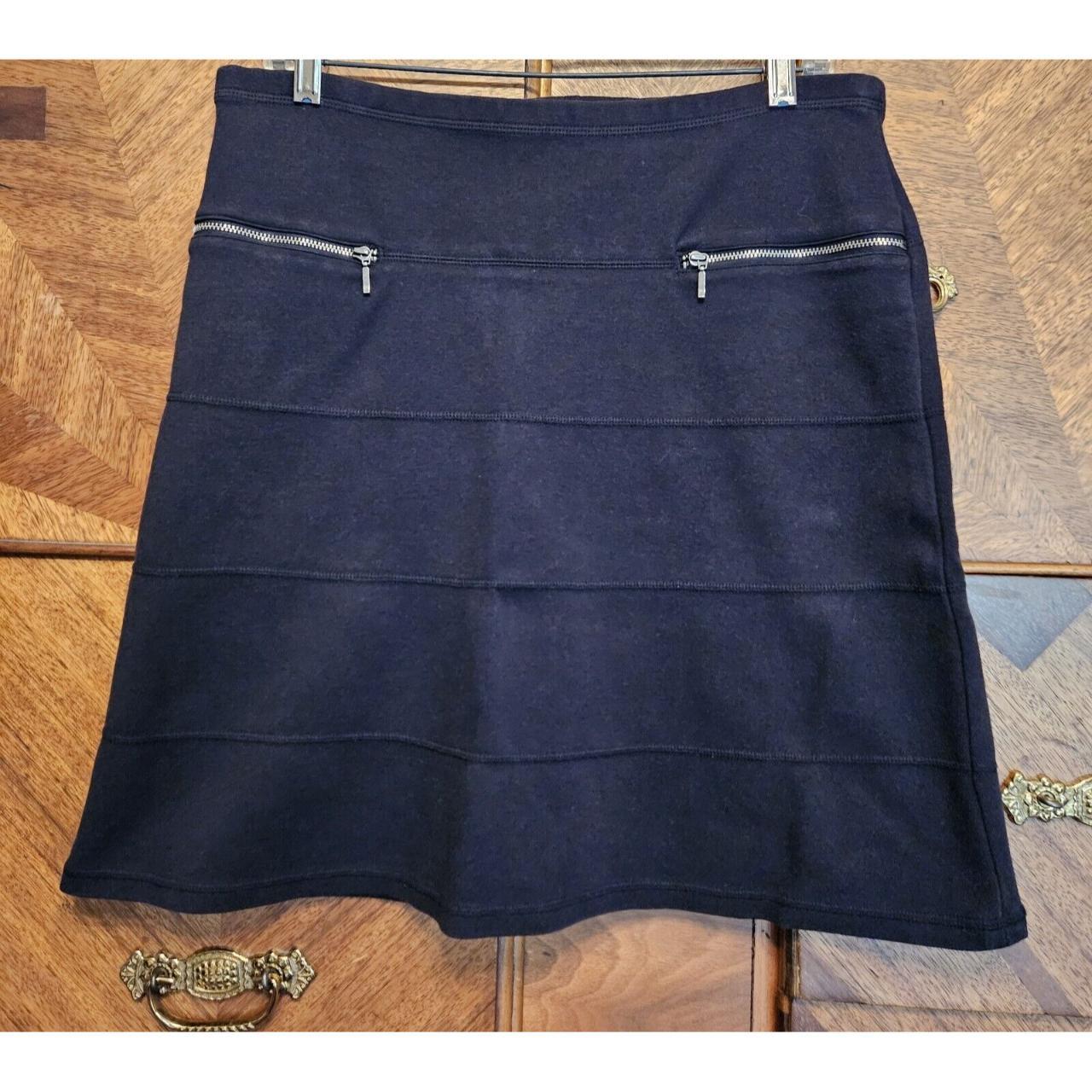 This black athletic skirt from Athleta is a... Depop