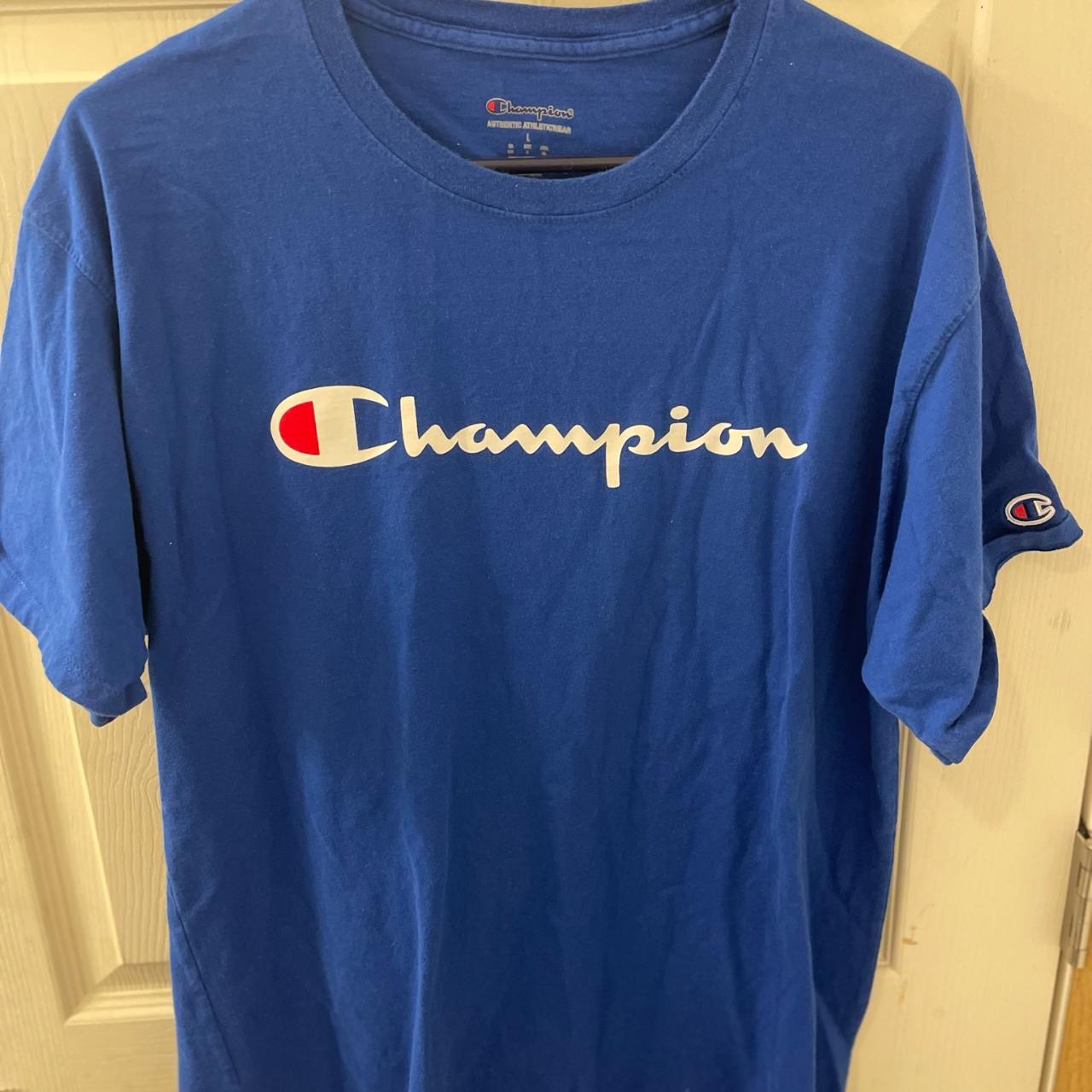 Champion Men's Blue T-shirt | Depop