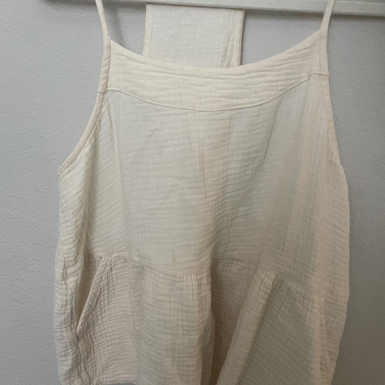 Cream color loose tank top. Super comfy. Thin... - Depop