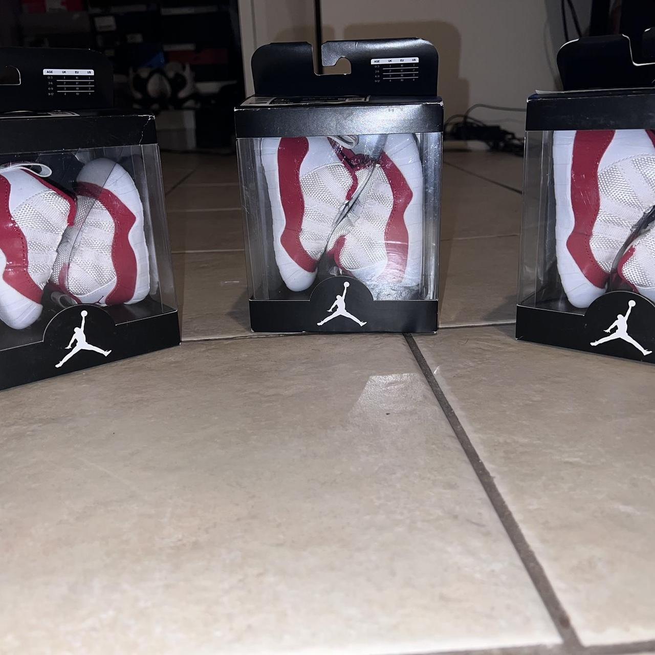 Jordan 11 Crib Bootie "Cherry" White/Varsity... Depop