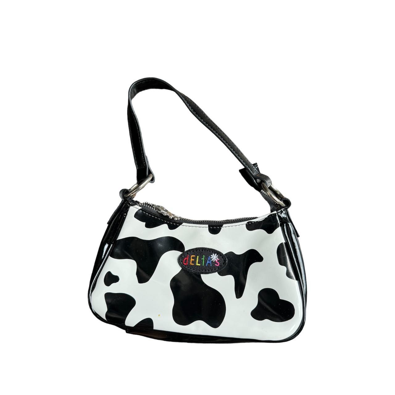 Cow print mini bag in black and white Delia s