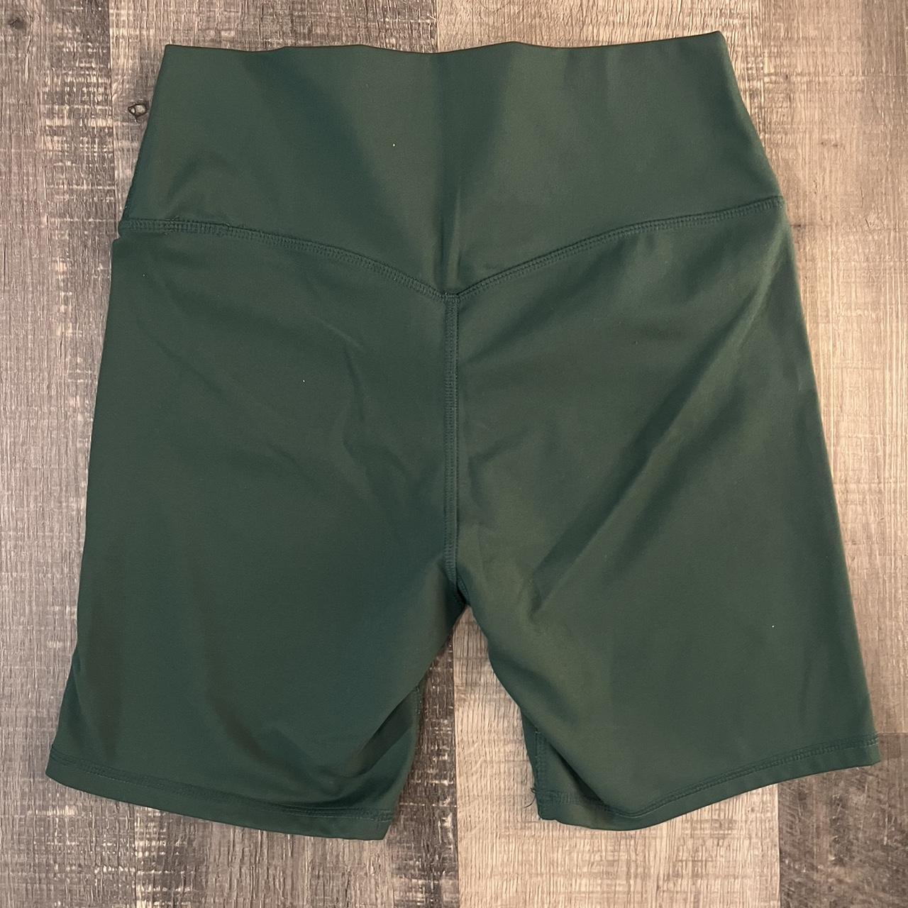 Super cute forest green biker shorts! Curved seams... - Depop