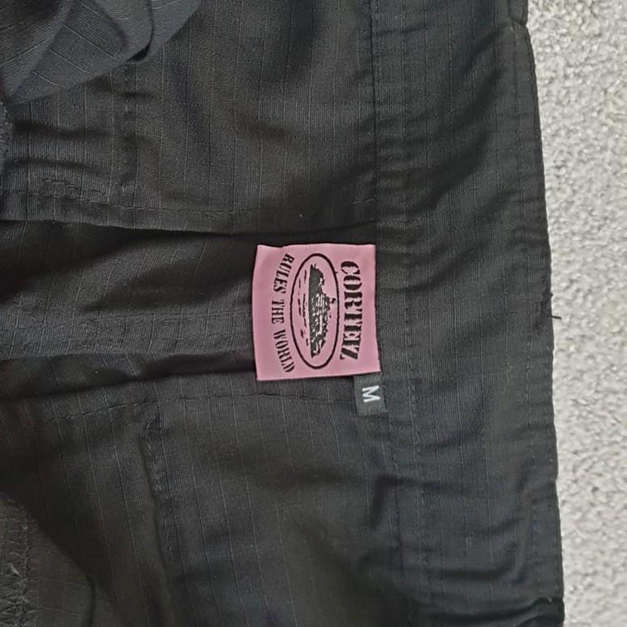 パンツ Corteiz Cargo Pants Black / Pink Limited edition Corteiz Guerillaz pink logo black | Depop