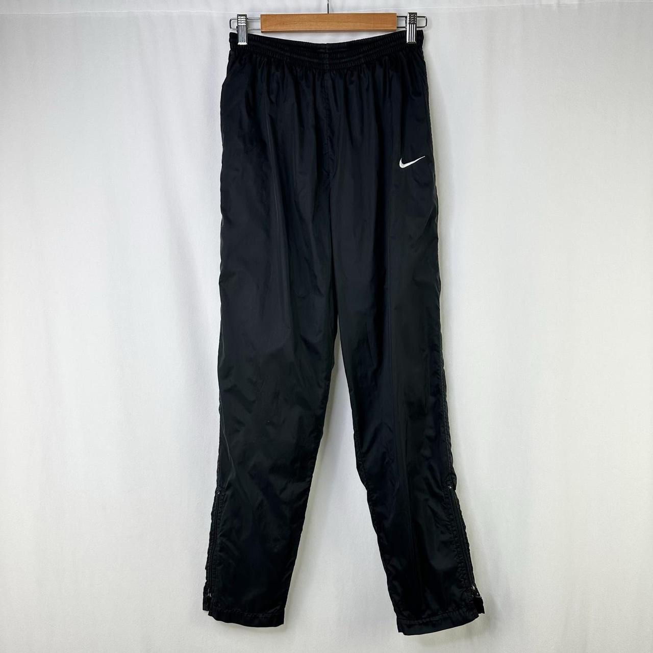 90's vintage black nike track pants, has lined