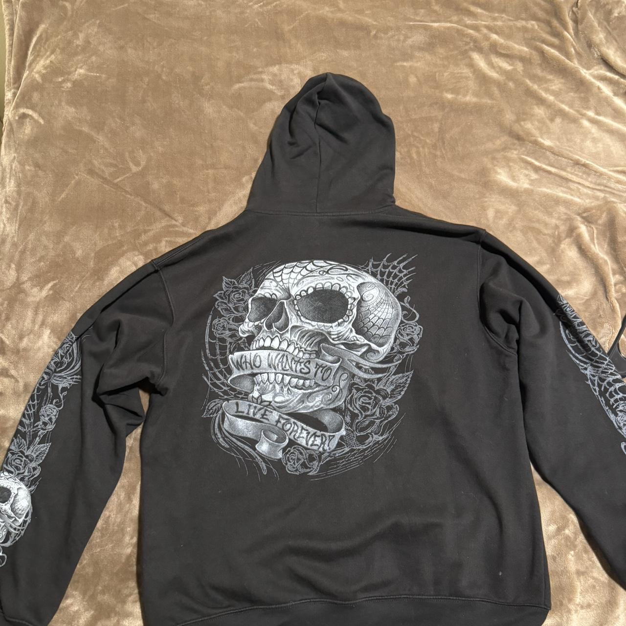 Affliction like skull hoodie size large and has a... - Depop