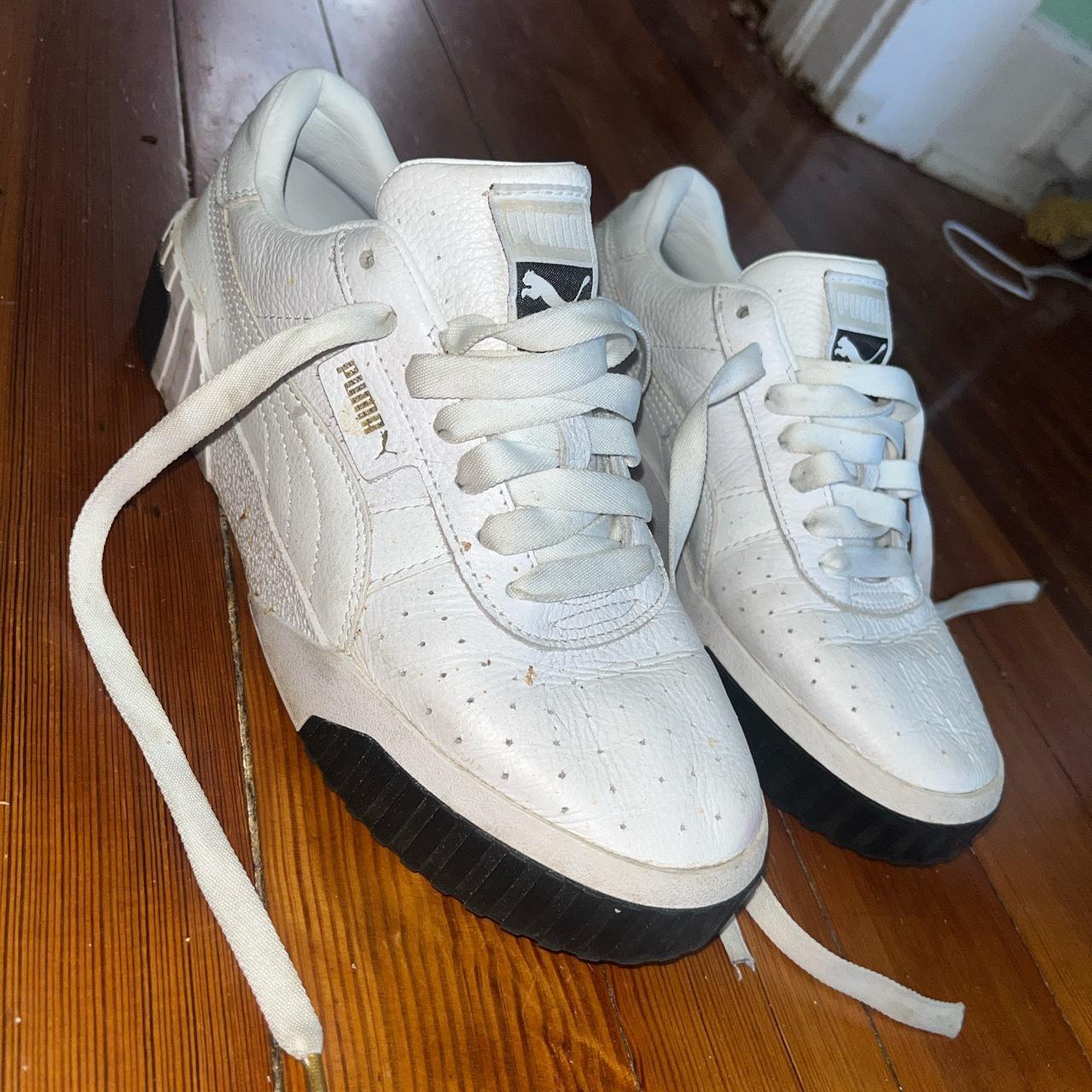 Cute black and white puma sneakers worn but in good Depop