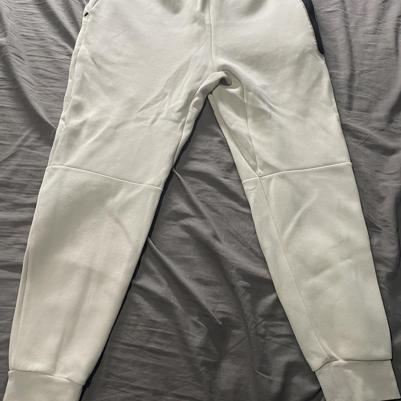 nike tech cream joggers