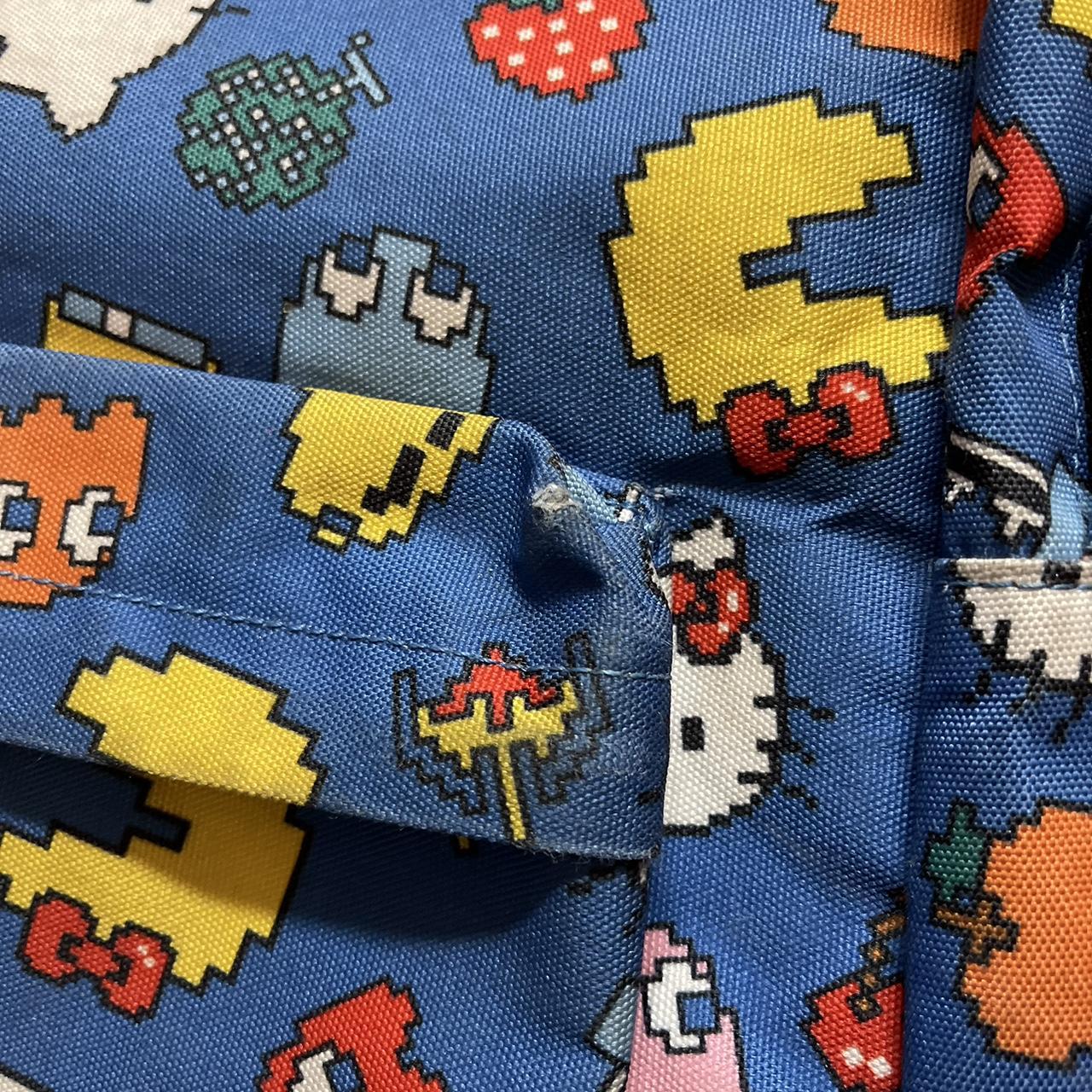 Hello kitty clearance pac man loungefly