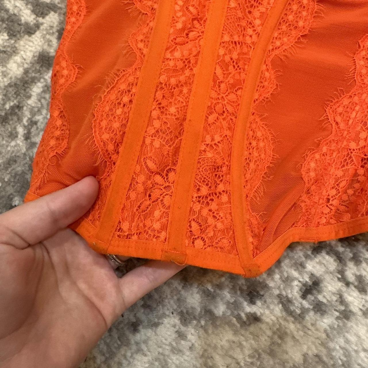 Urban Outfitters corset top. Bright orange 🍊 slight... Depop