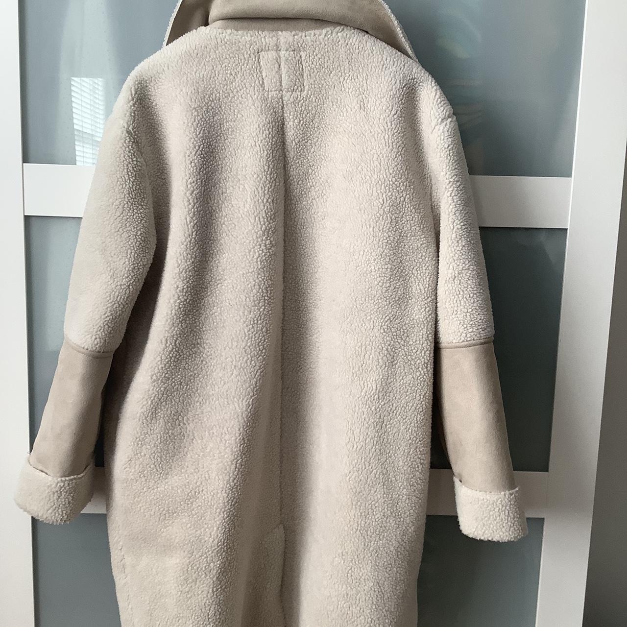 Cream faux shearling coat with bands of faux suede.... - Depop