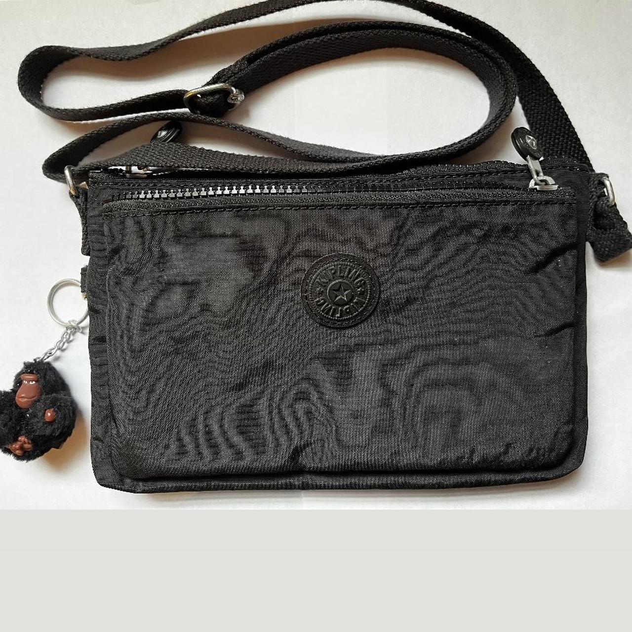 Kipling crossbody bag double pockets measures 6” by... Depop