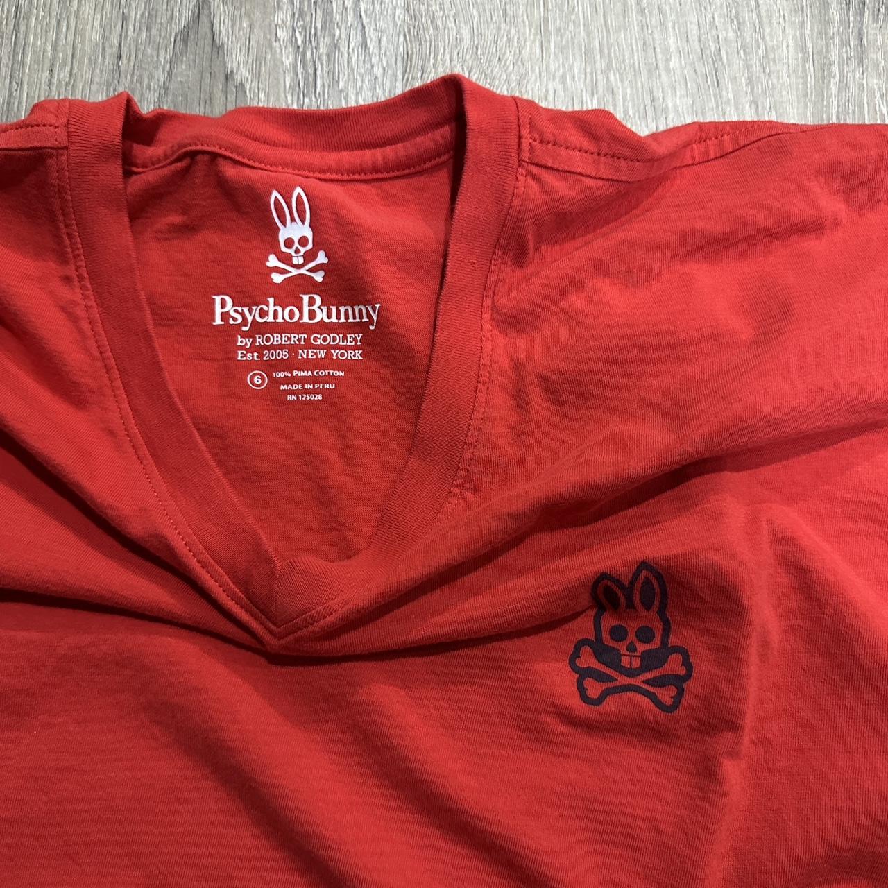 Psycho Bunny Red tee with a V neck size 6 which is... - Depop