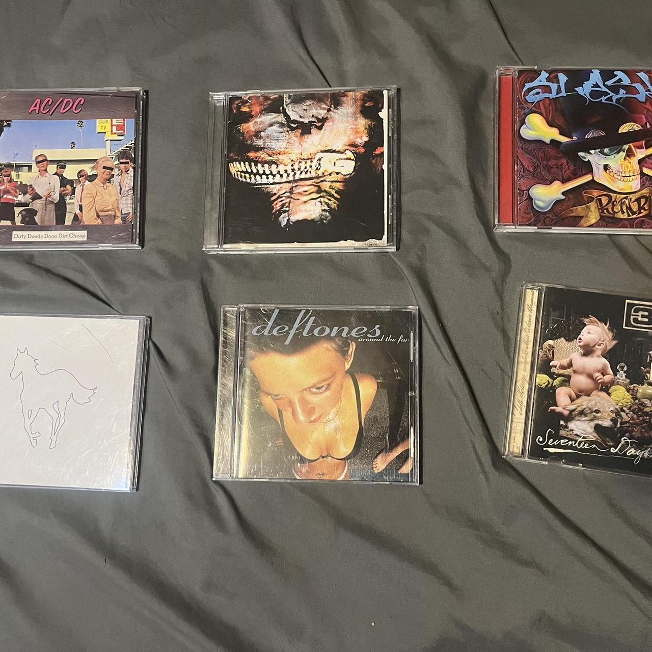 Bundle of 6 CDs - AC/DC, Deftones, Slash, No doubt,... - Depop