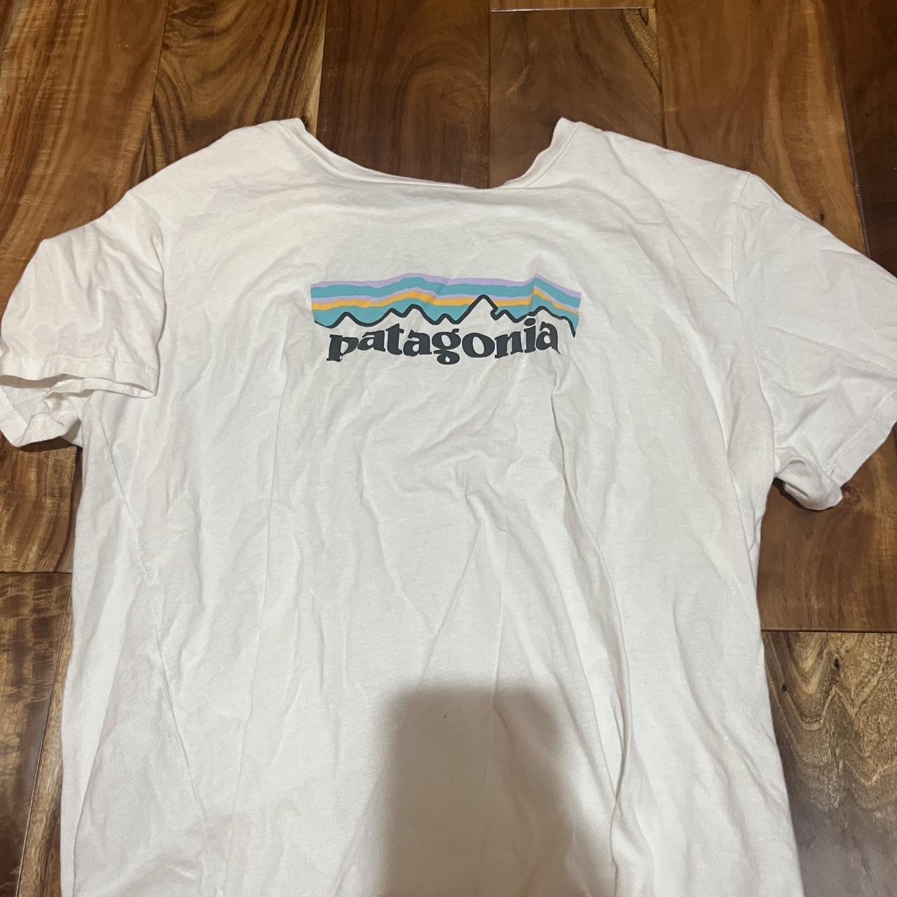 white patagonia women’s shirt size: M worn... - Depop