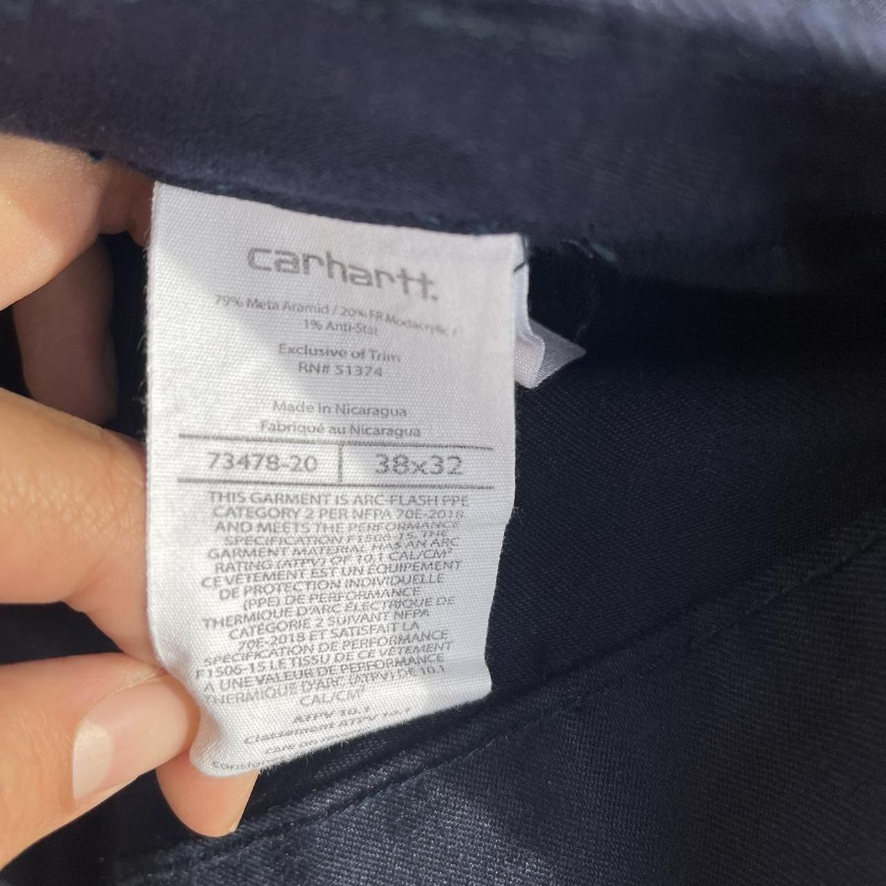 Carhartt Fire resistant navy baggy cargo pants... - Depop