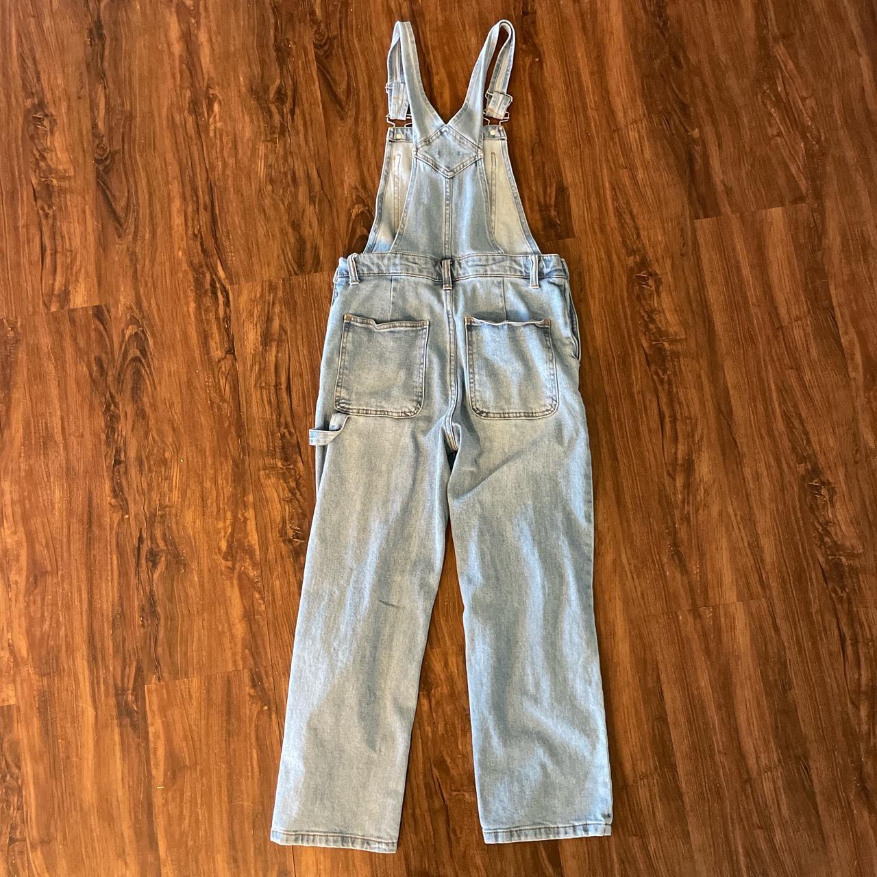 Cute jean overalls with rips in the knees & splatter... Depop