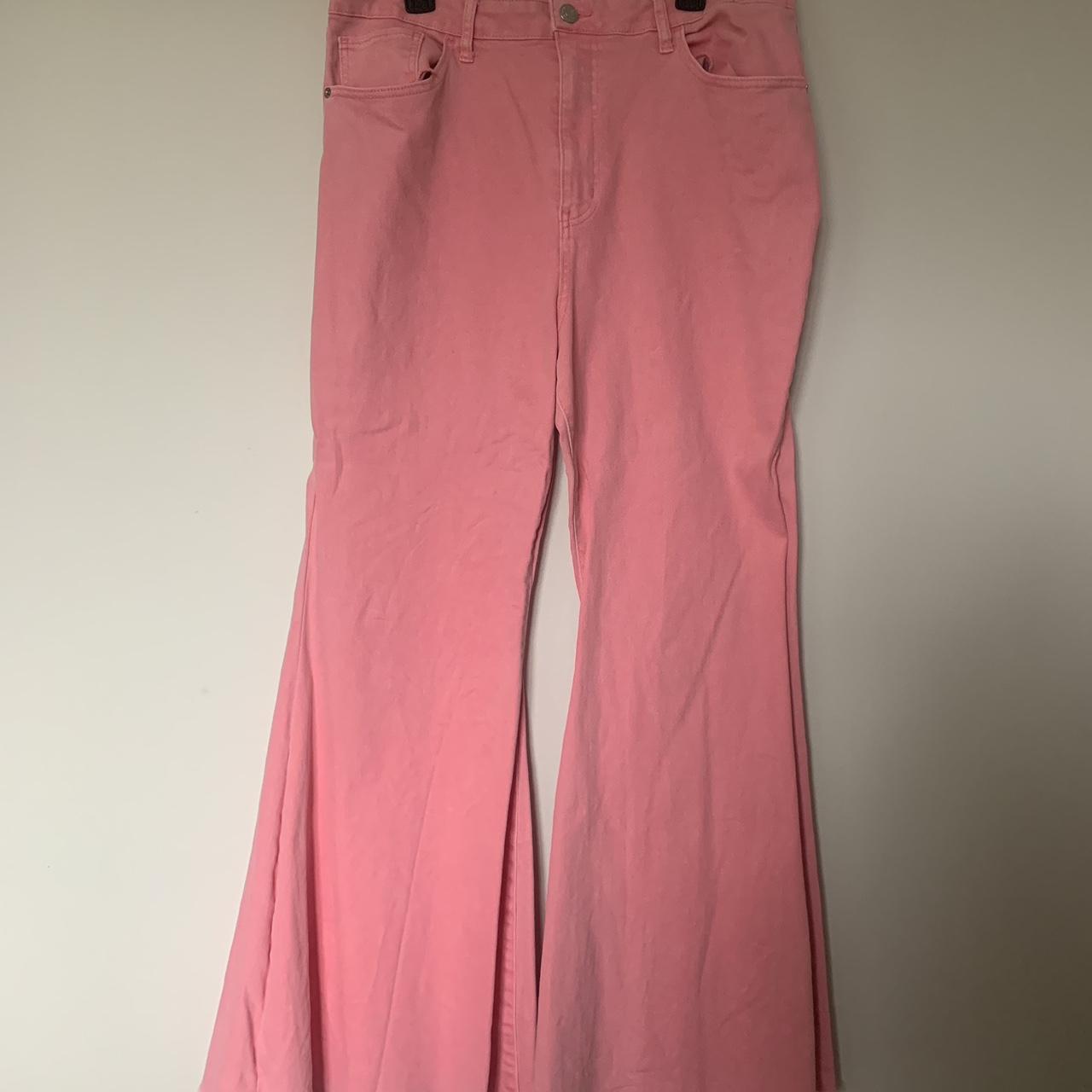 Pink extreme flair bellbottom and highwaisted... Depop