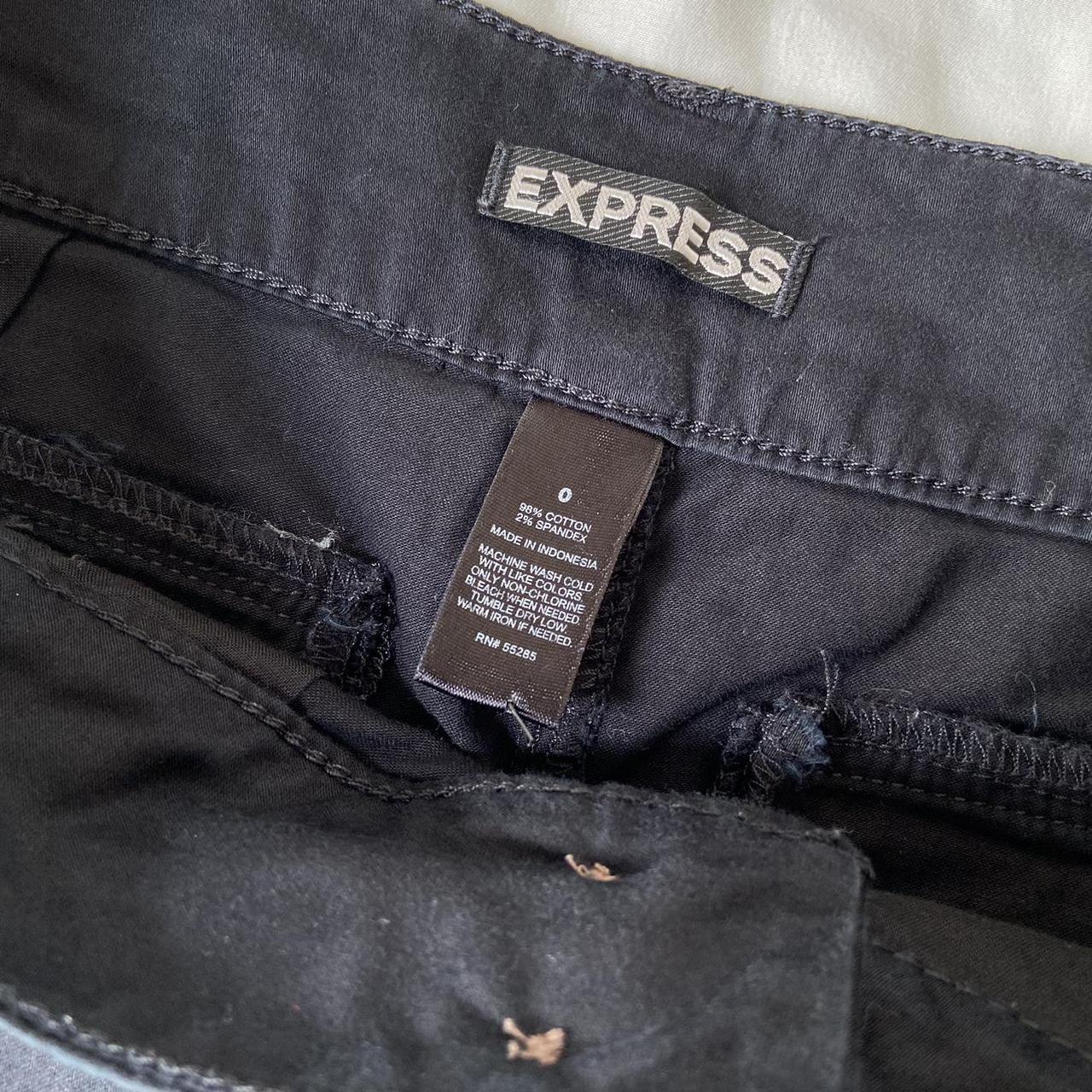 Low waisted black mini shorts from Express. Size is... - Depop