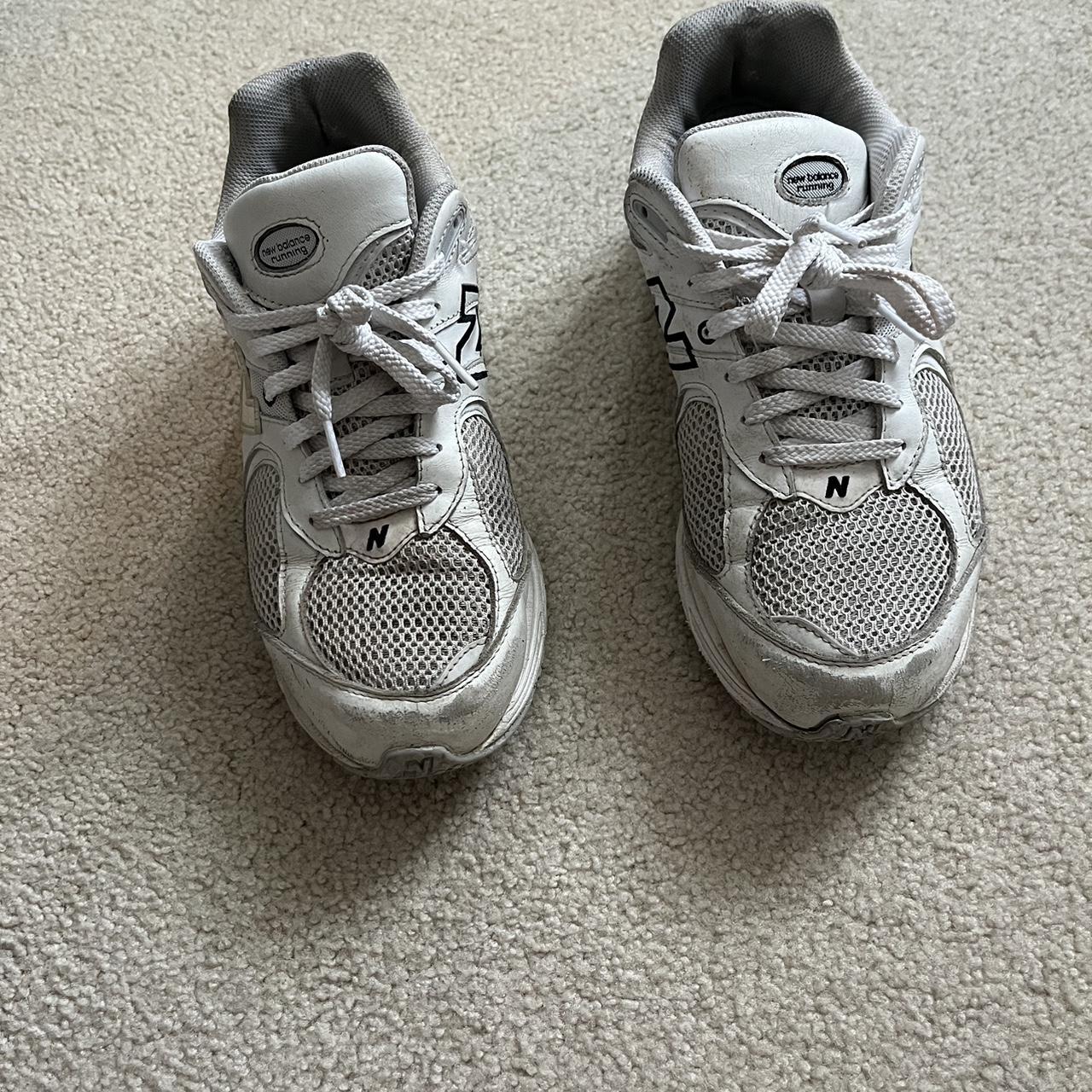 Grey and white new balance 2002R. Main discolor is... - Depop