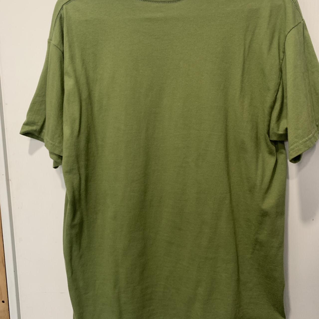 purdain green spider tshirt the spider lowkey big as... Depop