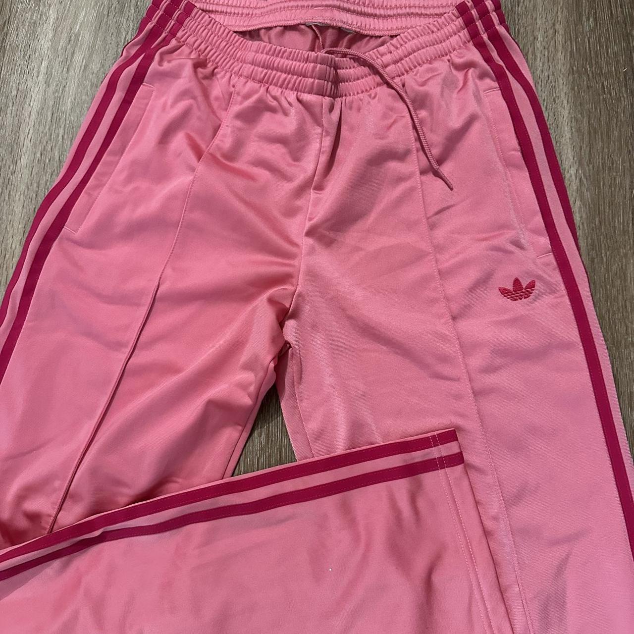 The prettiest double pink adidas track pants. Brand... Depop