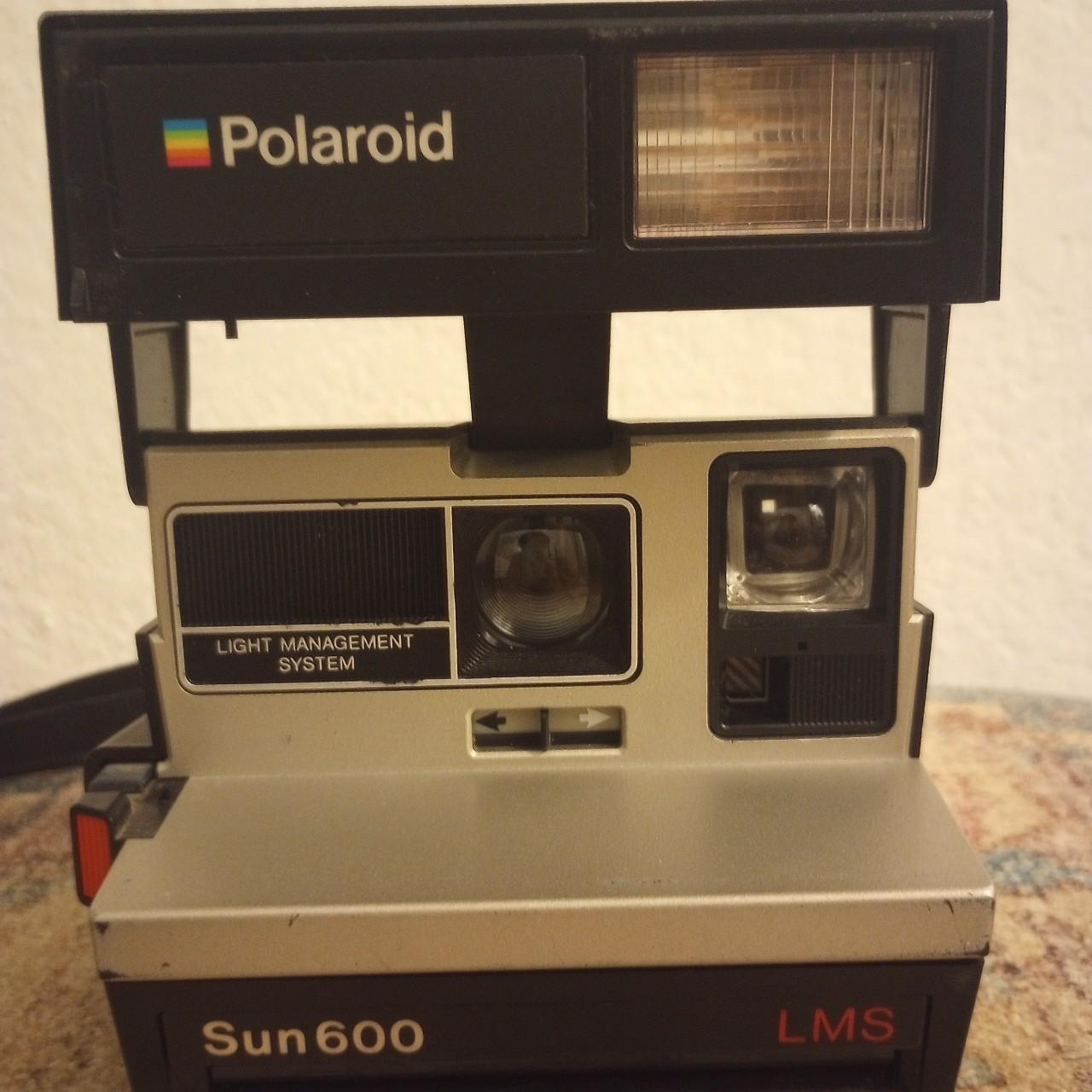 Vintage 80s Polaroid Sun 600 instant camera